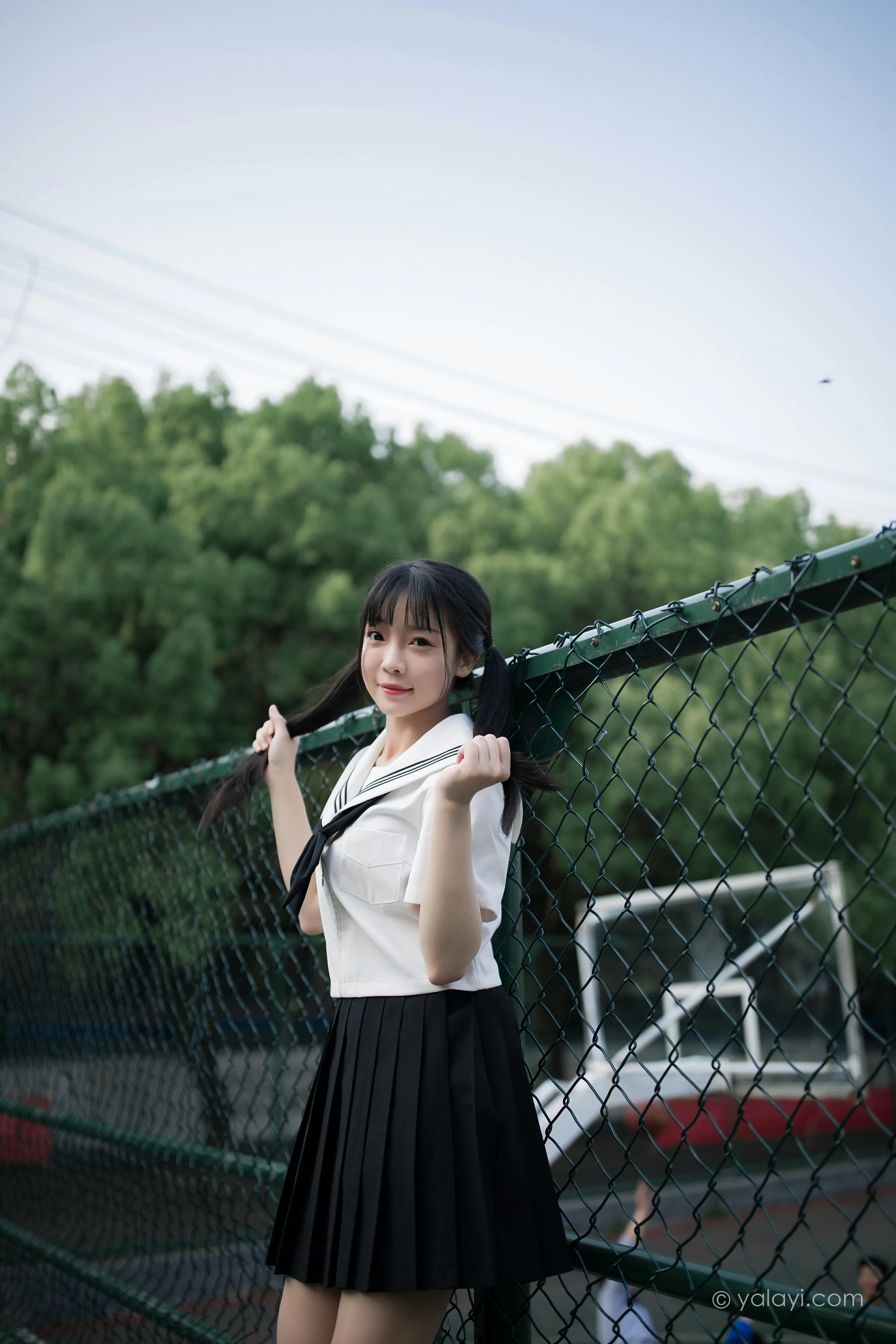 [YALAYI雅拉伊]NO.671 《放学一起走》 妙妙 JK水手制服与短裙加黑丝美腿写真第11张